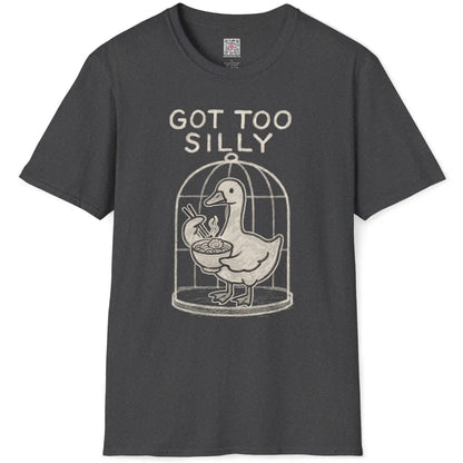 Lighthearted duck-in-cage scene with ramen and hand-drawn quote on dark heather t-shirt, flatlay.