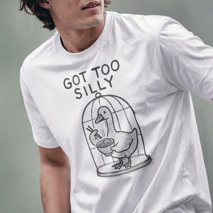 Male model in white tee with quirky duck holding ramen, playful Japanese food graphic design visible on chest.
