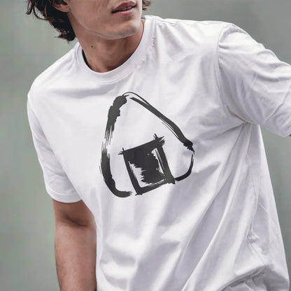 Male model wearing white shirt featuring minimalist line art of triangular rice ball with textured seaweed patch.