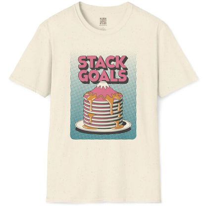 Natural fabric flatlay with playful pink pancake Mount Fuji stack and bold "STACK GOALS" block lettering.