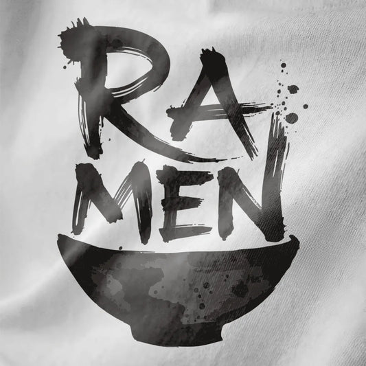 Close-up of black fabric showing bold brushstroke "RAMEN" text above textured ramen bowl.