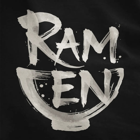 Close-up on black fabric showing expressive brushstroke ramen text shaped like a ramen bowl in monochrome palette.