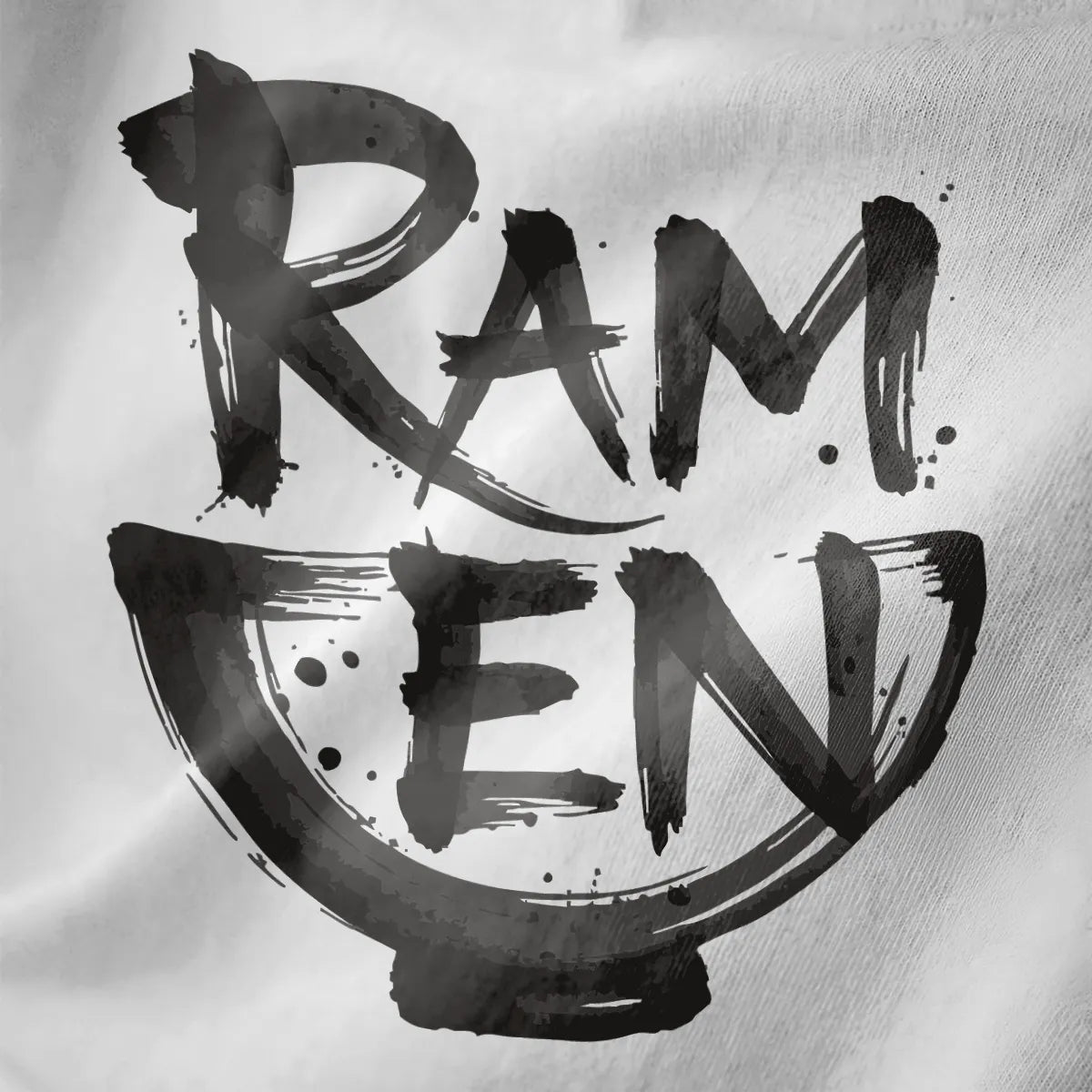 Close-up of bold brushstroke ramen text forming bowl on white fabric with textured monochrome design.