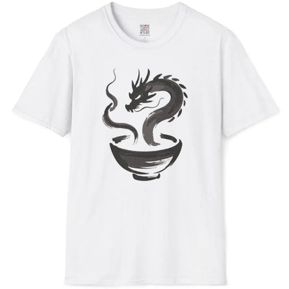 White t-shirt flatlay showcasing dynamic brushstroke dragon rising from ramen bowl in sumi-e art.