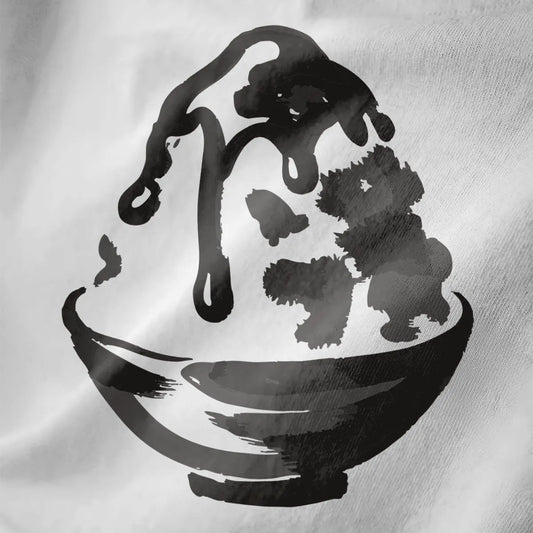 Close-up of white t-shirt showing artistic brushstroke kakigori design with monochrome Japanese sweet food style.