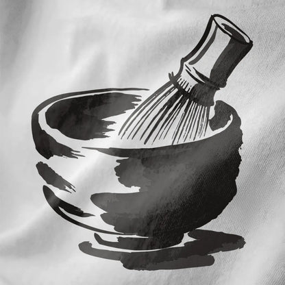 Monochrome brushstroke matcha bowl on white fabric, traditional tea ceremony and minimalist design.