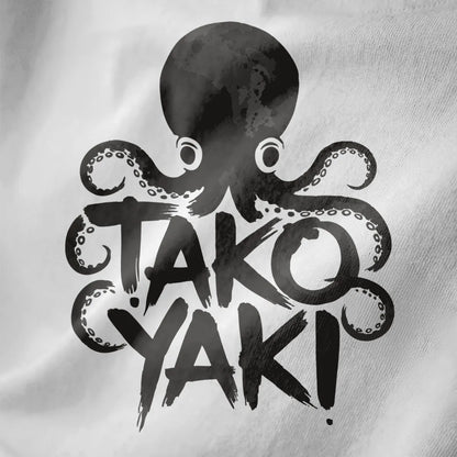 Watercolor style octopus with takoyaki text on white fabric close-up, playful octopus art, brushstroke.