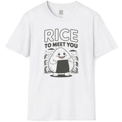White t-shirt flatlay showing kawaii onigiri character with arms, feet, and pun text on a wave-patterned backdrop.