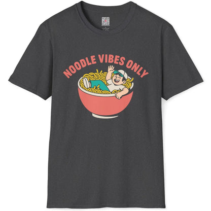 Dark heather tee flatlay with cartoon-style ramen bowl design and smiling figure inside noodles.