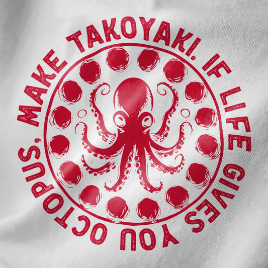 Closeup of white t-shirt showing bold red octopus and takoyaki balls with circular text, vibrant style, japanese t-shirts.