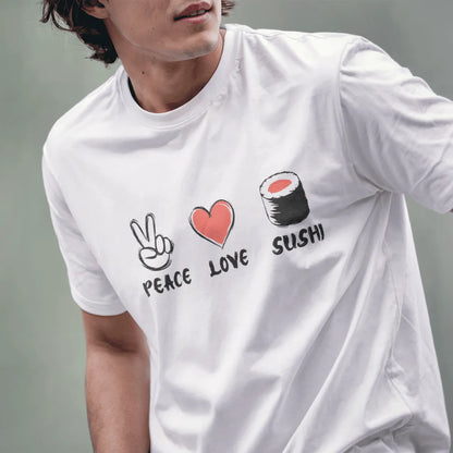 Male model wearing white t-shirt with playful Peace, Love, Sushi design featuring sketch-style icons.