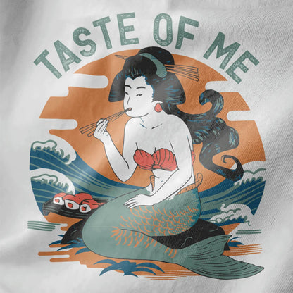 Close-up of mermaid sushi design on white fabric, featuring Japanese wave artwork and vibrant sunset colors.