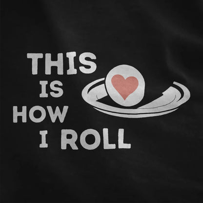 Black fabric with playful sushi roll and heart design, sushi t-shirt, humorous quote.