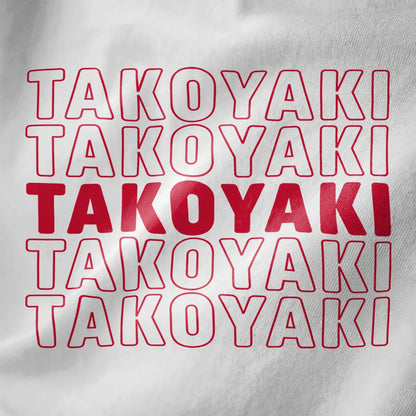 Close-up of white t-shirt showing bold “TAKOYAKI” grid in red, pop-art style, minimalist color scheme.