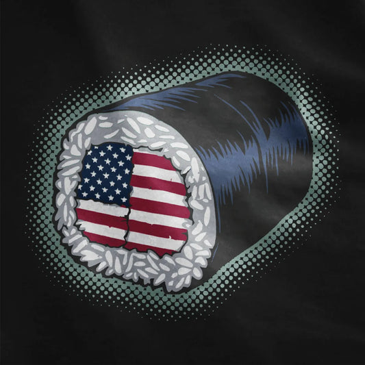 Close-up of sushi roll with American flag filling on black fabric, fusion cuisine, sushi t-shirt, patriotic.