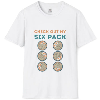 White t-shirt flatlay featuring six ramen bowls, bold teal text, orange accents; ramen t-shirt, graphic t shirts for ladies.